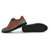 Golfschuh VitalloFlex Pro Hybrid – orangenes Pepita-Textil und graues Carbon, schwarze Sohle – Paaransicht mit Laufsohle