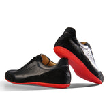 Sneaker VitalloFlex Puro RS – schwarzes Nappaleder und schwarzes Rauleder, rote Sohle – Paaransicht mit Laufsohle