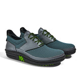 Golfschuh VitalloFlex Quantum Stinger – petrolfarbenes Mesh und graues Carbon, schwarze Sohle – Paaransicht schräg von vorn